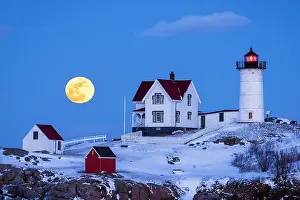 Moon Prints: Full moon over Nubble Lighthouse in winter, Cape Neddick, Maine, USA