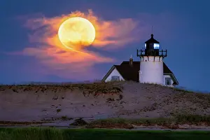 Cape Cod Prints: Full moon rising over Race Point Lighthouse on Cape Cod, Provincetown, Massachusetts, USA