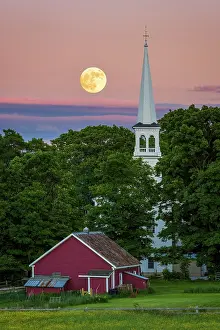 Barn Prints: Full moon risinsg over white-steeple church, Northeast Kingdom, Peacham, Vermont, USA