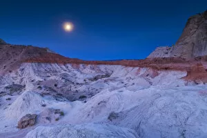 Images Dated 26th April 2022: Full Moon Setting over Paria Rimrocks, Grand Staircase Escalante National Monument, Utah, USA