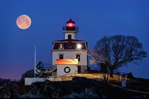 Moon Prints: Full moon setting over Pomham Rocks Lighthouse, Riverside, Rhode Island, USA