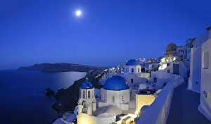 Images Dated 4th October 2013: Moon over the town of Oia, Santorini, Kyclades, South Aegean, Greece, Europe