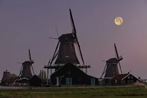 Images Dated 24th May 2022: Full Moon over Windmills, Zaanse Schans, Holland, Netherlands