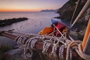 Moored canoes in Riomaggiore, Cinque Terre, Liguria, Italy