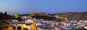 Moorish Alcazaba (castle) & city overview illuminated at dusk, Antequera, Malaga Province
