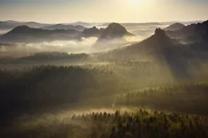 Morning atmosphere in the Elbe Sandstone Mountains, view of the Hintere RaubschloAA┬ƒ or
