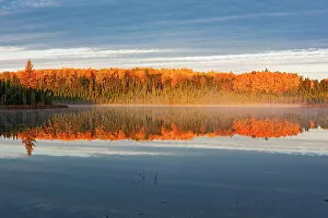West Collection: Morning fog in autumn at an unknown lake. Duck Mountain Provincial Park Manitoba, Canada