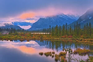 Images Dated 20th April 2023: Morning light peaking through clouds, Banff National Park, Alberta, Canada