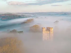 Winter Morning Prints: Morning mist surrounds The Belvedere tower at dawn on a winter morning