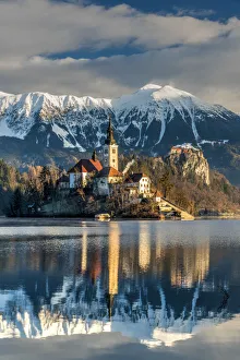 Images Dated 22nd December 2017: Morning sunlight over Church of the Assumption of Mary, Lake Bled, Upper Carniola