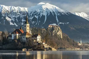 Images Dated 10th January 2018: Morning sunlight over Church of the Assumption of Mary, Lake Bled, Upper Carniola