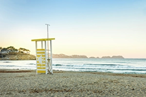Lifeguard Tower Prints: Morning sunrise at the beach of Cala Fornells, Mallorca, Balearic Islands, Spain