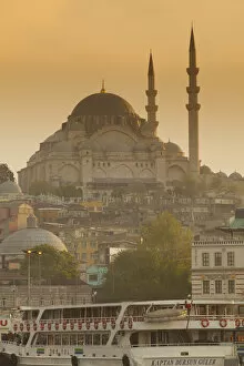 Images Dated 13th November 2013: Mosque and ferries on the waterfront of the Golden Horn, Istanbul, Turkey