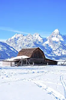 Jackson Hole Prints: Moulton Barn, Mormon Row in Winter with lots of Snow Freezing Cold Grand Teton National Park