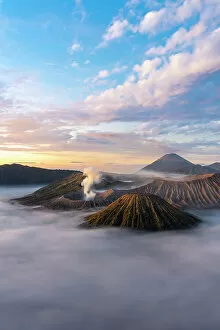 Images Dated 28th February 2023: Mount Bromo, sunrise over volcano in clouds, Mount Batok, Mount Kursi, Mount Semeru