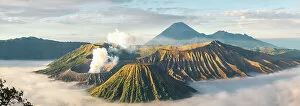 Images Dated 28th February 2023: Mount Bromo, sunrise over volcano in clouds, Mount Batok, Mount Kursi, Mount Semeru