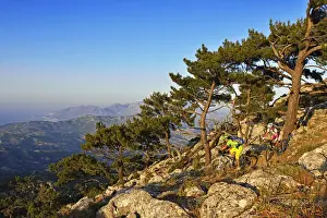 Mountain bikers in Stavros, Selakano overlooking Agios Nikolaos, Crete, Greece, Europe