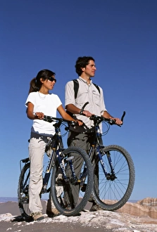 Images Dated 5th February 2009: Mountain biking amidst the wind-eroded peaks and lunar landscape of Moon Valley