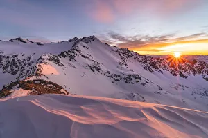 Images Dated 29th April 2020: Mountain landscape from italian Alps during a winter sunrise