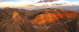 Las Palmas Prints: Mountain road crossing the volcanic landscape near Sicasumbre astronomical viewpoint