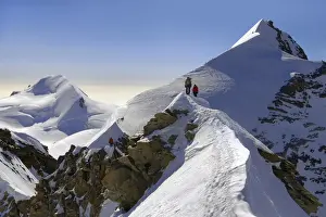 Alpinism Prints: Mountaineers climbing sharp ridge of ‚Aucrossing of Liskamm‚Au