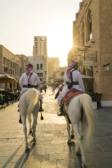 Doha Prints: Mounted police on horses, Souq Waqif, Doha, Qatar