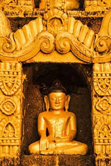Images Dated 1st March 2016: Mrauk-U, Rakhine state, Myanmar. Detail of a small Buddha statue in a stupa