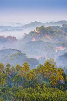 Mrauk-U, Rakhine state, Myanmar. Mrauk-U valley in a foggy sunrise seen from the Shwetaung