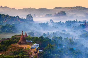 Mrauk-U, Rakhine state, Myanmar. Mrauk-U valley in a foggy sunrise seen from the Shwetaung
