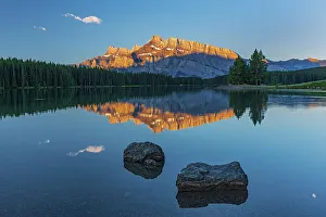 Images Dated 20th April 2023: Mt. Rundle reflected in Two Jack Lake at sunrise, Banff National Park, Alberta, Canada