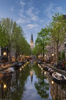 Images Dated 24th May 2022: Munt Tower Reflecting in Canal, Amsterdam, Holland, Netherlands