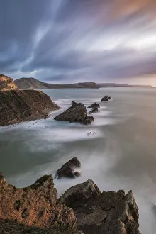 Mupe Rocks at sunrise, Isle of Purbeck, Jurassic Coast World Heritage Site, Dorset Mupe Rocks at sunrise, Isle of Purbeck, Jurassic Coast World Heritage Site, Dorset