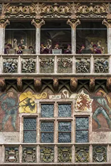 Music band performing on the balcony of the Goldenes Dachl landmark structure, Innsbruck