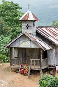 Tattoo Prints: Myanmar, Burma, Chin, Two old ladies of the Ngraa tribe with tattooed faces on the steps of a wooden church