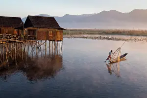 Shan State Prints: Myanmar, Burma, Shan, Fishermen in dugout canoes on Inle Lake at dawn