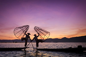 Myanmar (Burma), Shan State, Inle Lake, local fishermen at sunset