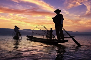 Myanmar (Burma), Shan State, Inle Lake, local fishermen at sunset