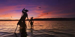 Myanmar (Burma), Shan State, Inle Lake, local fishermen at sunset