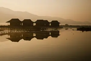 Stilts Prints: Myanmar, Inle Lake. A misty dawn at Golden Island Cottages
