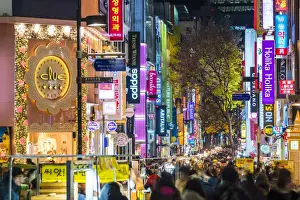 Busy Prints: Myeong-Dong district at night. The location is the premiere district for shopping