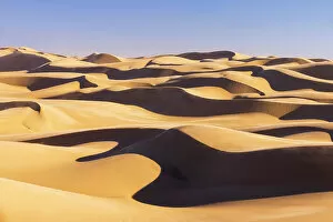 Namibian Gallery: Namibia, Walvis Bay, Namib desert sand dunes reaching the ocean