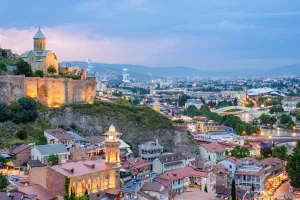 Transcaucasia Prints: Narikala Fortress and historic buildings in the Abanotubani bath district at dusk
