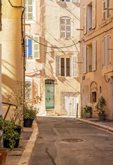 Alleyway Prints: Narrow alleyway in the Old town area of Le Panier in Marseille
