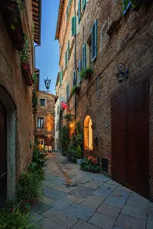 The narrow streets of Pienza at dusk. Pienza, Orcia valley, Siena province, Tuscany, Italy