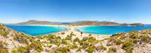 Clear Prints: The narrow stretch of white sand which divides Simos beach viewed from a ridge