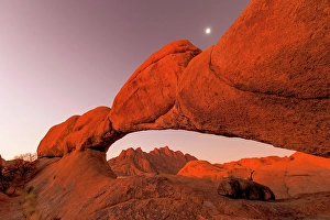 Spitzkoppe Prints: Natural granite arch and moon at twilight, Spitzkoppe, Namib Desert, Namibia
