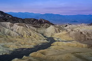 Desolate Gallery: Natural rock formations at Zabriskie Point at dawn, Death Valley National Park