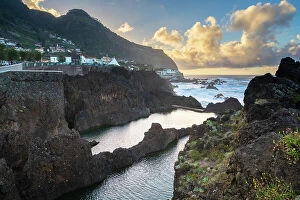Images Dated 7th August 2023: Natural volcanic rock swimming pools at sunset, Porto Moniz, Madeira, Portugal