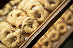 Circle Prints: Neapolitan taralli with almonds, a traditional savory snack, displayed in Naples, Italy