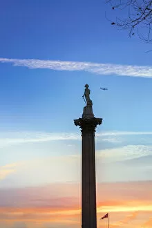Nelsons Column in Trafalgar Square at twilight, West End, Central London, England